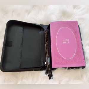Gorgeous, faux leather bible caring case with pink bible. Brand new never used.